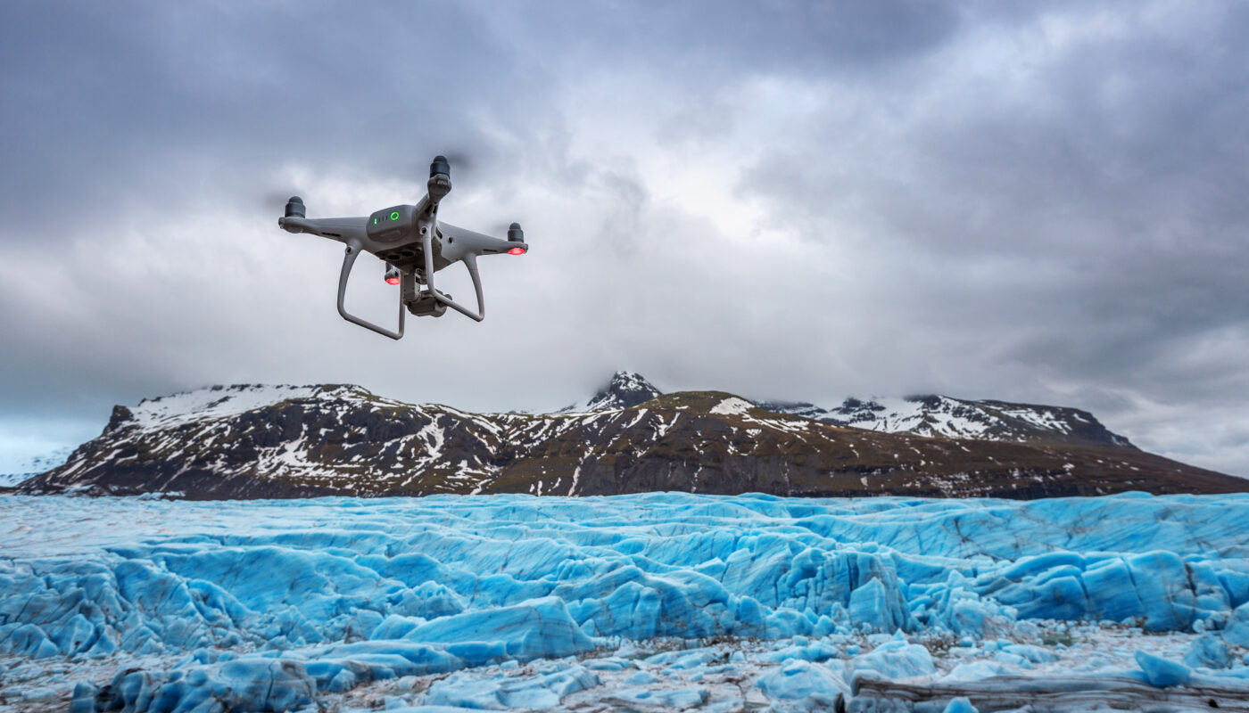 https://www.freepik.com/free-photo/drone-with-camera-is-flying-iceberg_11768944.htm#fromView=search&page=1&position=0&uuid=f46c1370-ba46-4ee3-82db-fef0d1774c64&query=The+Ethics+of+Drone+Use+Around+Glaciers