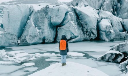 https://www.pexels.com/photo/person-standing-on-ice-near-glacier-5111047/
